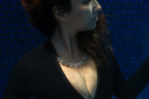 limu firecracker necklace on model uw